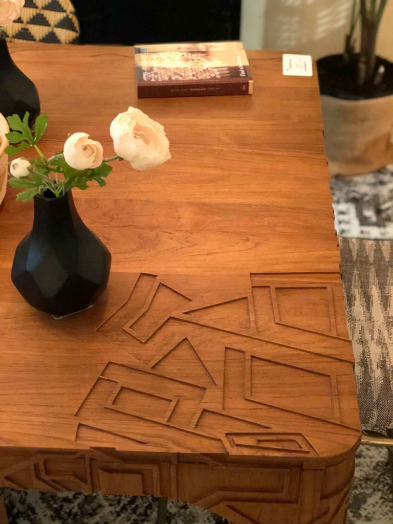 Carved corner detailing adds pizzaz to a teak dining table from Selamat Designs.